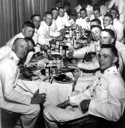 When and where was this picture taken? Can anyone identify the 15 people at the table?
